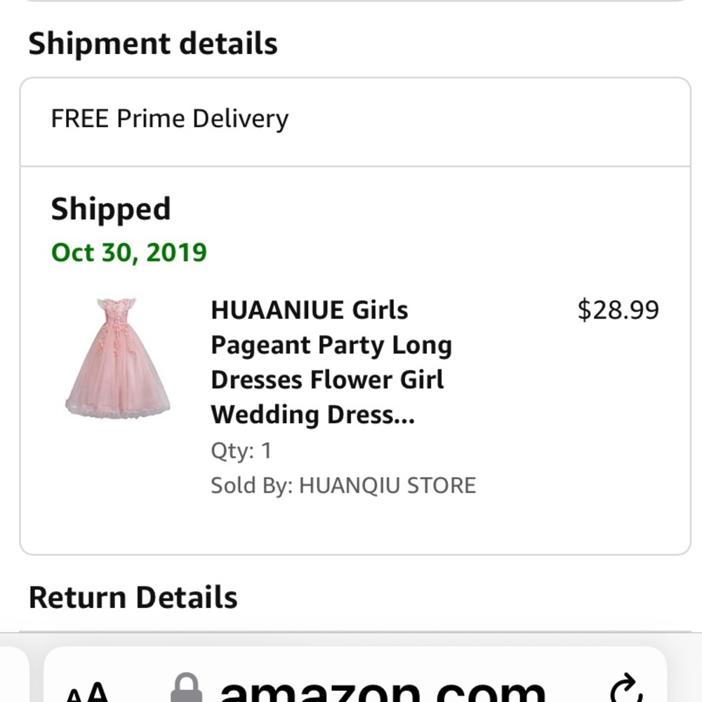 A pink gown with slightly torn hem - only worn once
